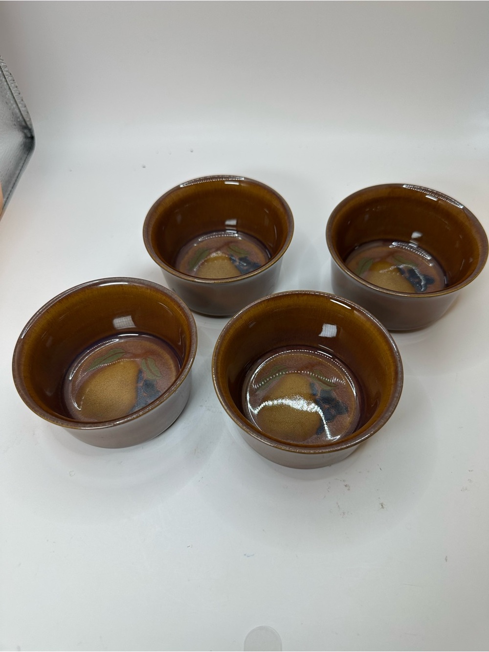 Set of 4 Denby Orchard Stoneware Ramekins feature a glossy brown Glaze.